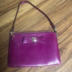 Coach wristlet magenta with gold